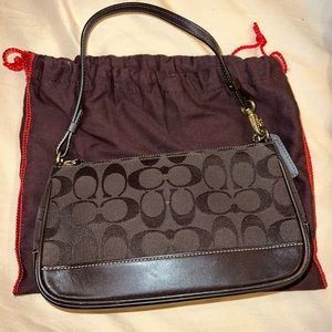 Used coach bag with handle.